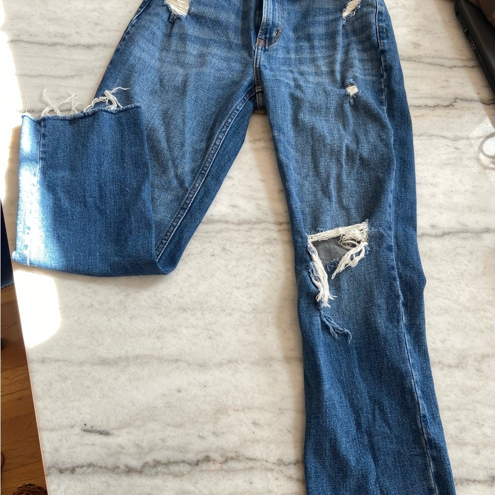 Women's Distressed Blue Jeans